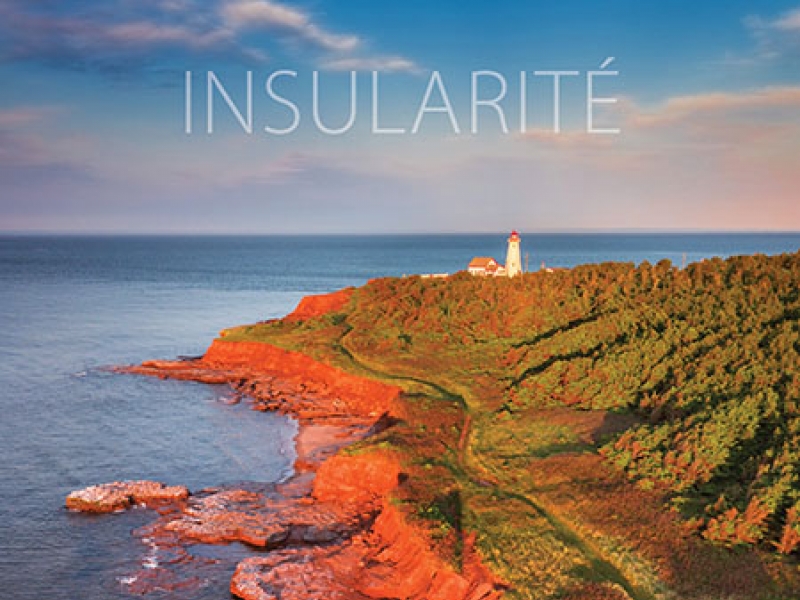 Booklet cover with image of red cliff and lighthouse