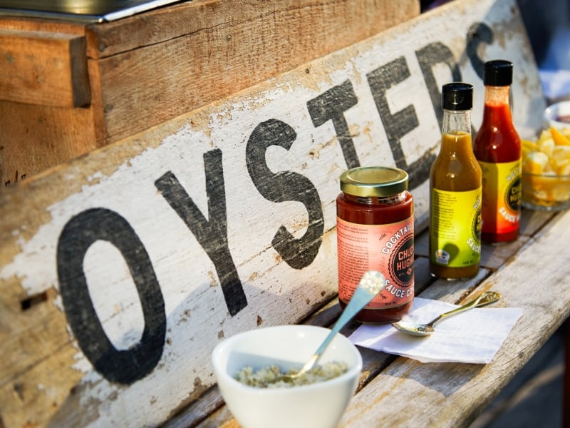 Oyster sign and condiments