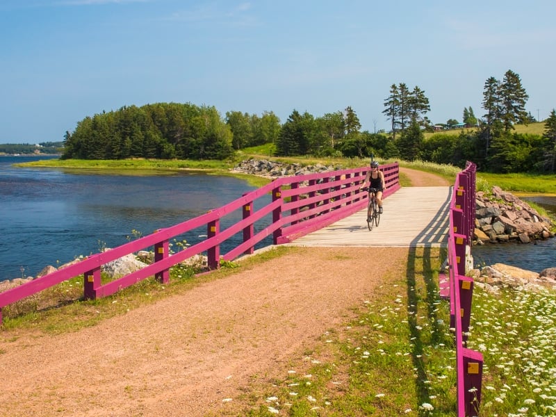 Confederation Trail St Peters, bridge, biker Confederation Trail St Peters, bridge, biker