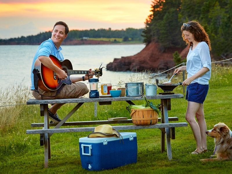 Northumberland Camping, guitar, ocean, couple, dog