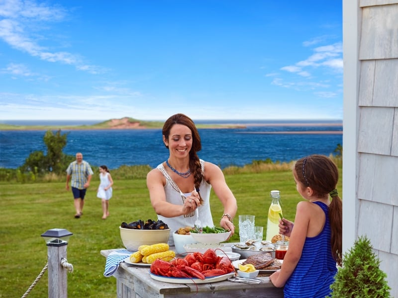 Fisher with group of visitors providing directions