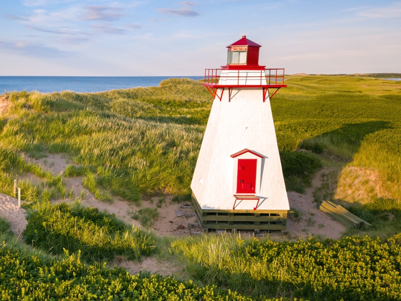 St Peters Harbour, Lighthouse, hills, beach