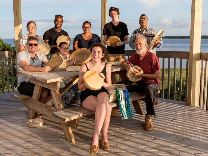 Beat of One Drum, musicians, group of people, instruments 