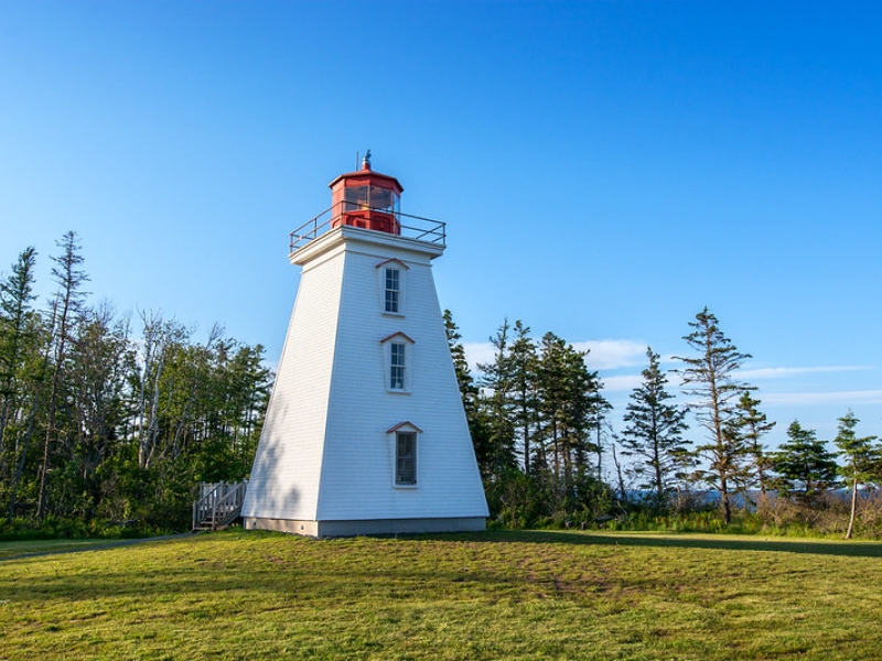 Exterior view of Cape Bear Lighthouse in summer
