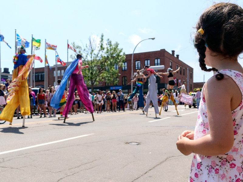 PEI Pride Parade, stilts, child, crowd