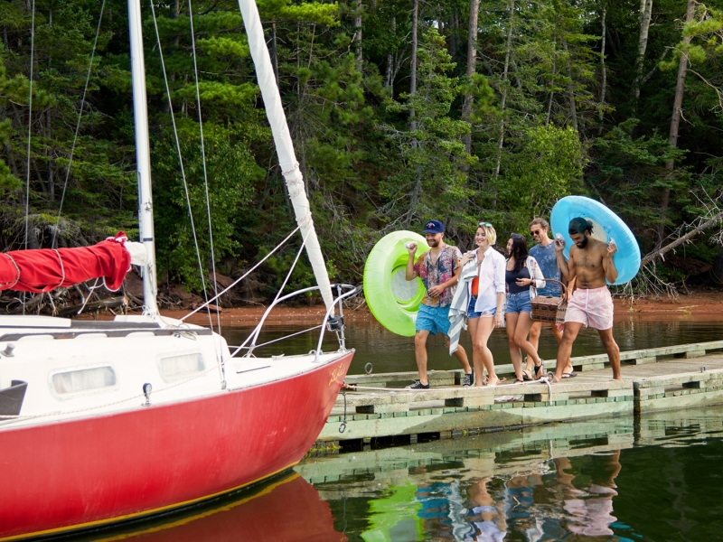 Boat, group of people, docks, inner-tubes