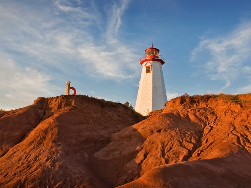 Seacow Head Lighthouse with red cliffs in front