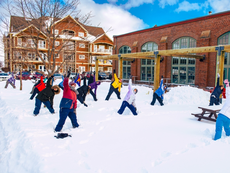 Group doing snoga outside of Founders' Hall, Charlottetown