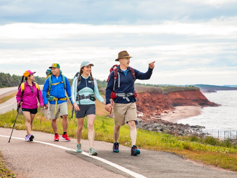 Group of 4 on Island Walk route in PEI National Park, near Orby Head