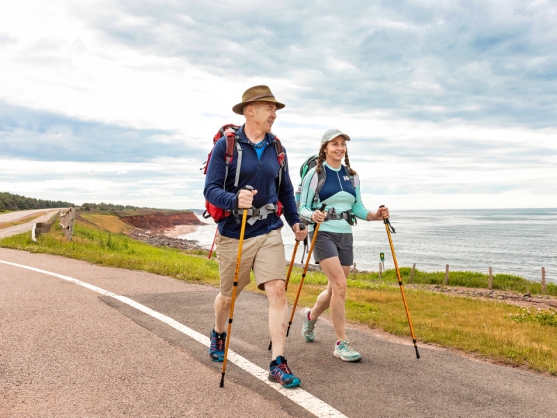 Couple hiking along Gulfshore Parkway in PEI National Park on the Island Walk route