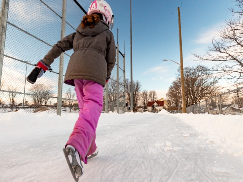 Young girl skating on oval at Queen Elizabeth Park, Summerside