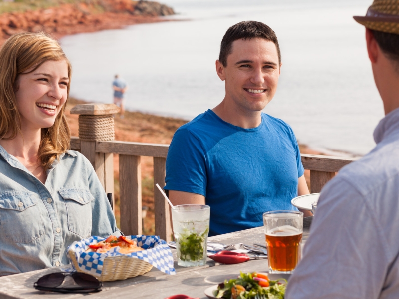 Group dine on deck at Point Prim Chowder House