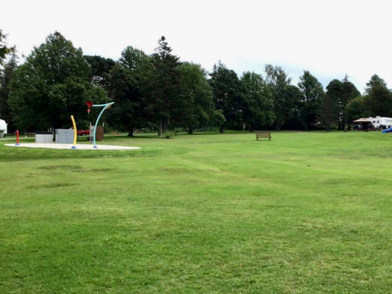 Large green space, splash pad and playground