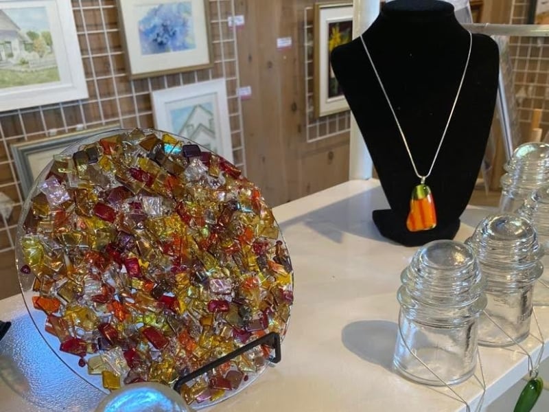 Selection of PEI-made items including glasswork and watercolour art at Artisans Waterfront Montague