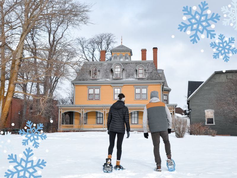 Couple snowshoeing at Beaconsfield Historic House, PEI