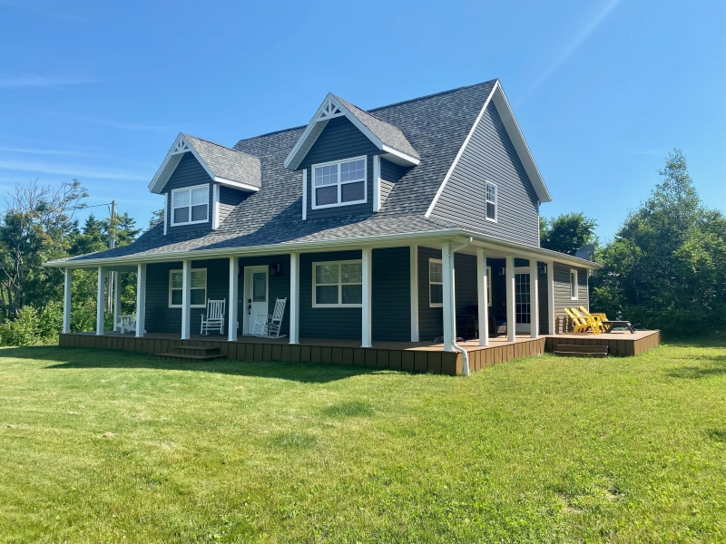 Beautiful grey Cape Cod home with full wrap around verandah