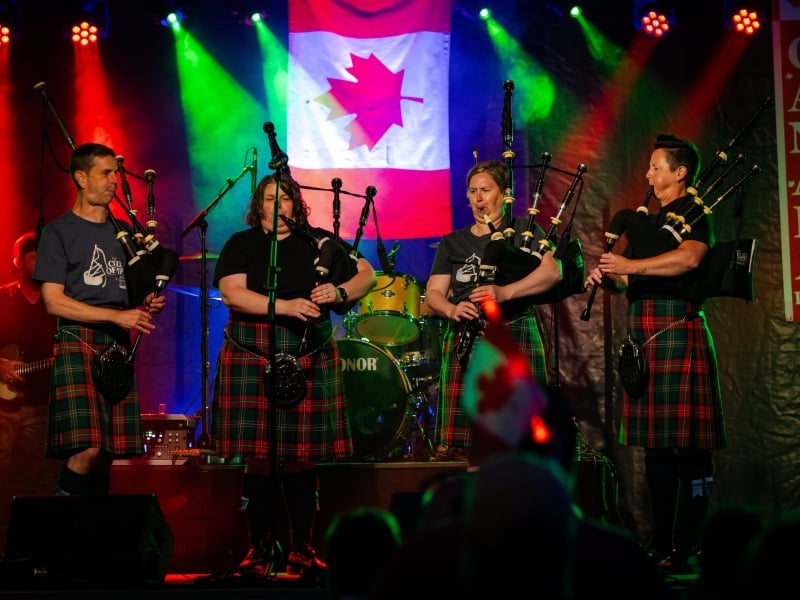 College of Piping pipers perform on stage at Canada Day celebrations in Summerside