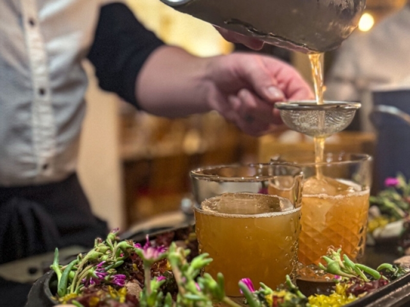 Chef pours drinks through sieve at Inn at Bay Fortune