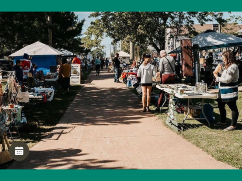 Image of craft vendor set up on Confederation Trail on green background
