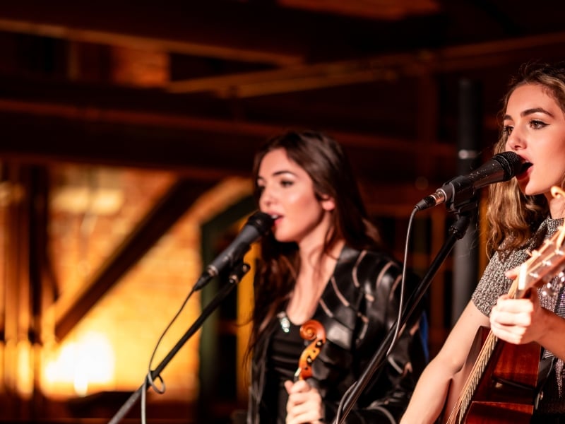 Ava and Lily Rashed perfom live music at Founders' Food Hall & Market