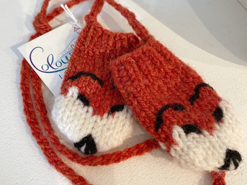 Knitted red fox mittens with string