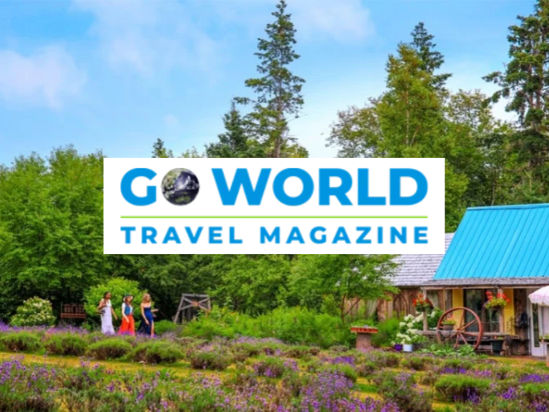 Island Lavender Distillery in background with Go World Travel Magazine logo