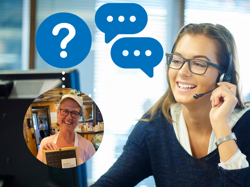 Stock image of call centre female support staff on computer and phone with image of tourism operator in foreground