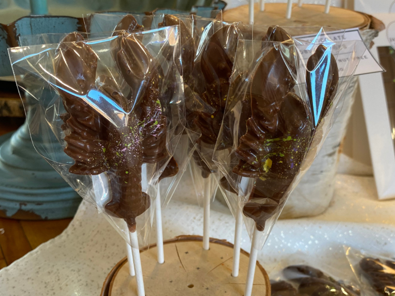 A display of chocolate lobsters on a stick at Jane & Sue Chocolate