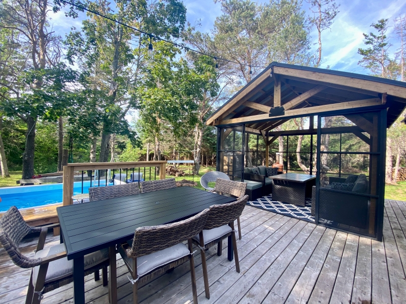Large deck and covered gazebo with outdoor pool 