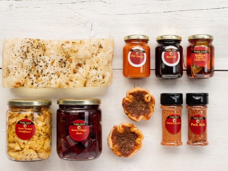 Display of Noble Chef PEI products: spice blends, pickles and sauces