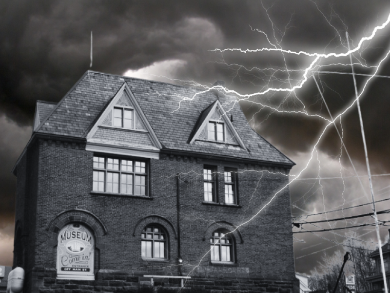 Garden of the Gulf Museum in black and white under threat of a lightening storm