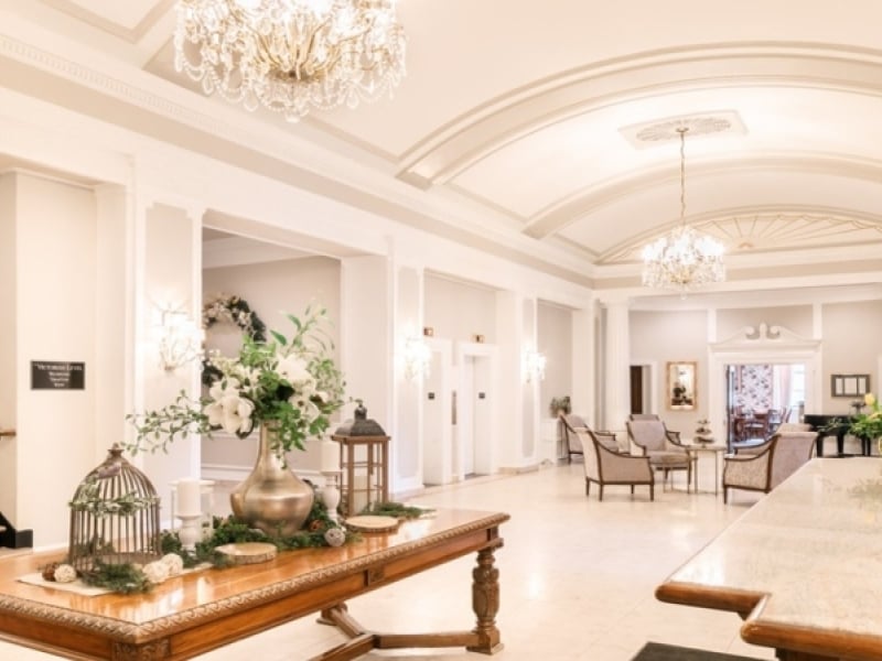 View of Rodd Charlottetown lobby with curved ceilings and chandeliers