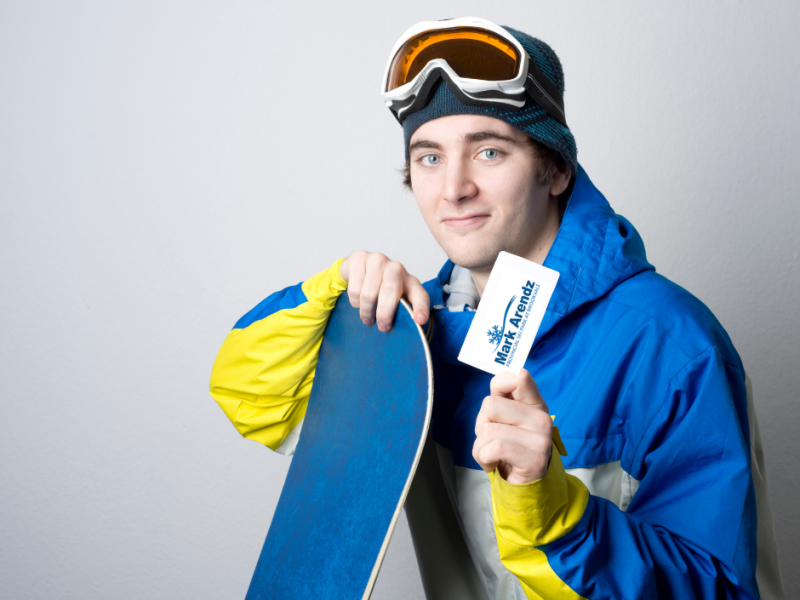 Stock image of snowboarder nolding pass card