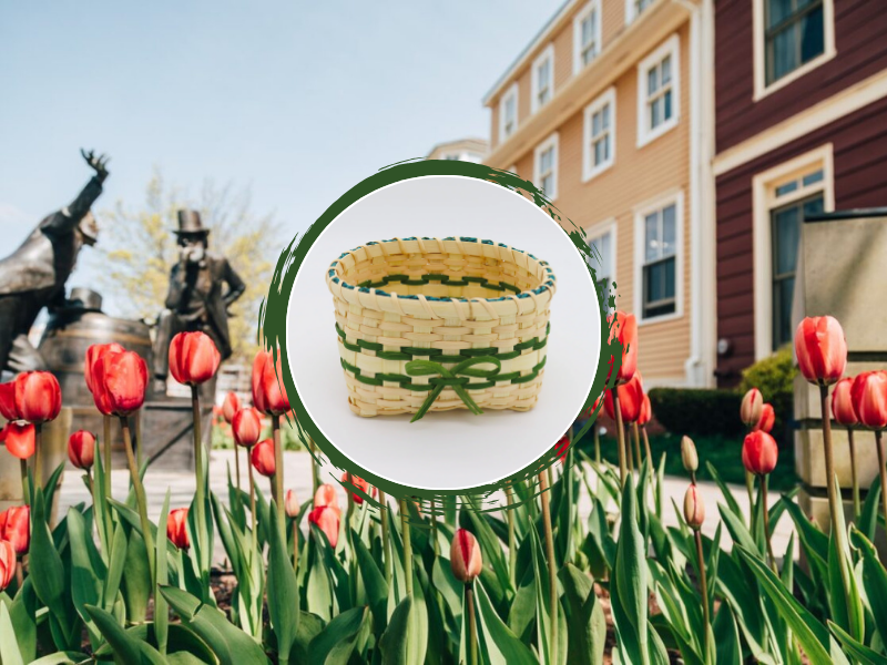 Great George Street in spring with blooming tulips and image of Indigenous basket in front