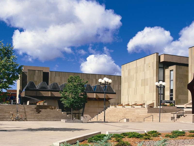Outside view of the Confederation Center, beautiful blue skies above the Confederation center beige brick buildings              ederaation center