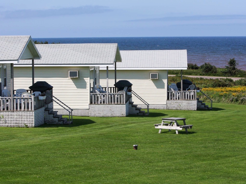 Three white cottages with ocean view, PEI