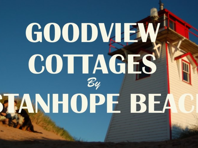 photo of a white and red lighthouse on the dunes with Goodview Cottages by stanhope beach written over it in white lettering