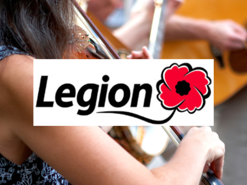 Stock image of female on fiddle with guitar player in background; Legion logo in foreground