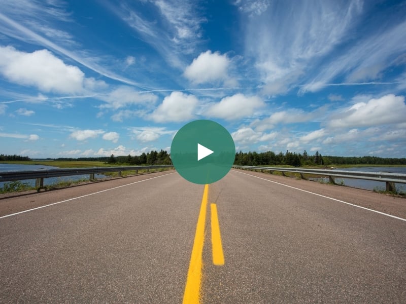 Road image with play button