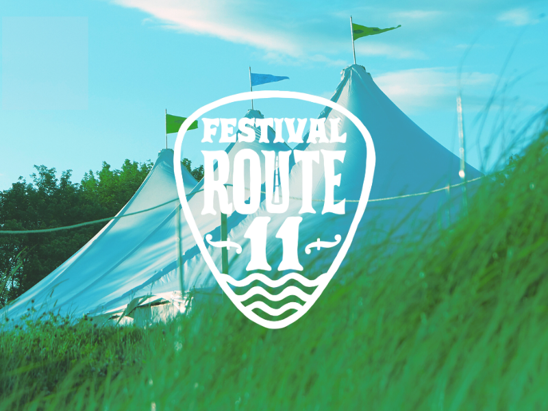 Festival Route 11 logo in front of image of event tents