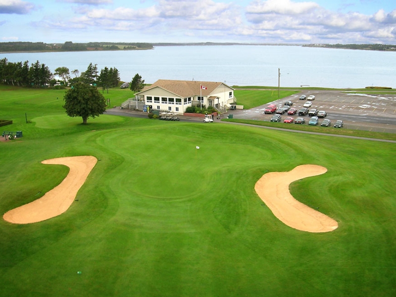 Airele view of one of the golf greens, sandtraps and club house at Stanhope Golf and Country club