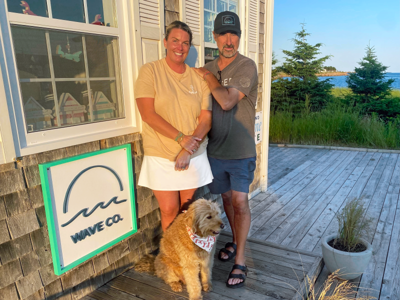 The Trainors and Crosby, the shop dog at Wave Co.