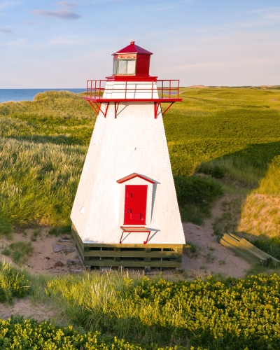 St Peters Harbour, Lighthouse, hills, beach