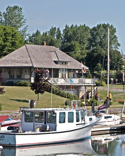 Exterior view of Montague Train Station from the waterfront in summer, home of the visitor information centre