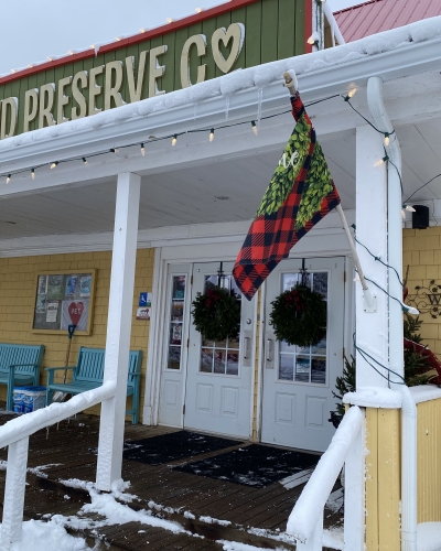 Exterior view of front door of PEI Preserve Co in winter