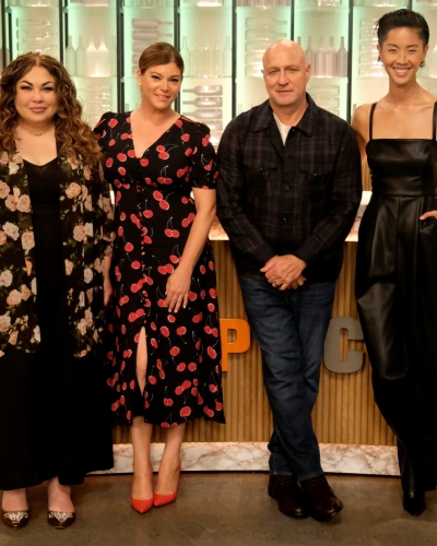Image of Chef Ilona Daniel with hosts of Top Chef US on tv set