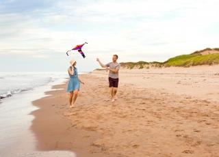 Lakeside Beach, kite, couple, sand, running