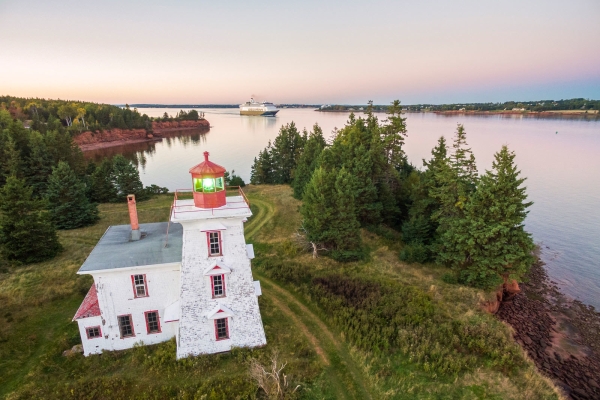 Aerial view of Blockhouse Lighthouse with cruise ship in background