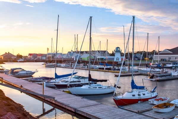 Sailboats in marina in Summerside at sunset