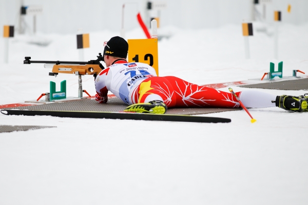 Paralympian Mark Arendz shooting down targets at a Biathlon event